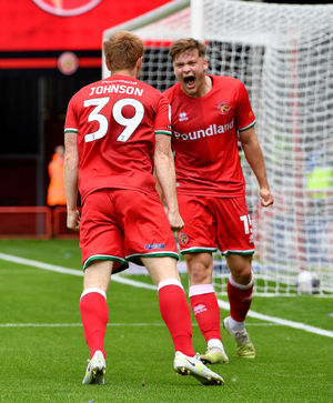 Danny Johnson celebrates his goal with Freddie Draper
