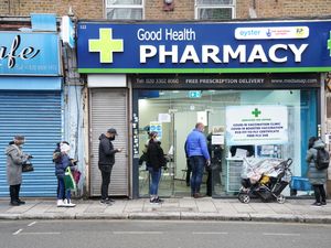 Supporting image for story: People queue for ‘jingle jabs’ on Christmas Day as Covid battle continues