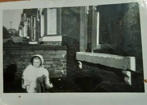 Dianne pictured in around 1959 wearing a dress and coat taken off one of her beloved dolls
