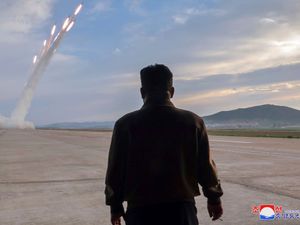 Supporting image for story: Kim Jong Un watches as North Korea carries out missile tests