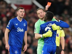 Everton’s Idrissa Gana Gueye is held back by Jordan Pickford after a confrontation with team-mate Michael Keane