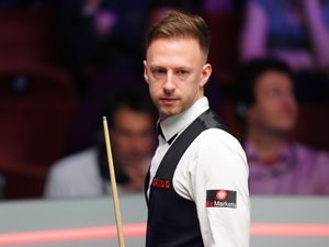 Supporting image for story: Judd Trump brushes off cue confusion to beat John Higgins in Wuhan