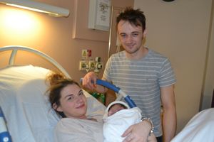 Baby Leo with his parents Hayley and Adrian