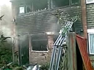 Supporting image for story: Man and dog escape blaze