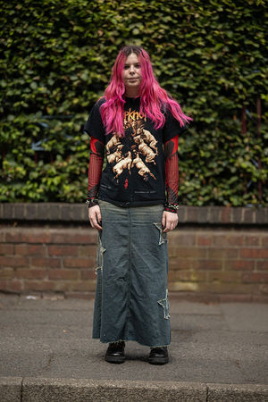 Music fan Grace Blockley arrives to attend British rock band Black Sabbath's "Back to The Beginning" concert, Ozzy Osbourne's final ever gig as Black Sabbath's frontman at Villa Park in Birmingham, central England on July 5, 2025. Osbourne, who revealed in 2020 that he has Parkinson's disease, will join Tony Iommi, Geezer Butler and Bill Ward for the all-day "Back To The Beginning" show in Birmingham, central England, where the heavy metal giants formed in 1968. (Photo by Oli SCARFF / AFP) (Photo by OLI SCARFF/AFP via Getty Images)          