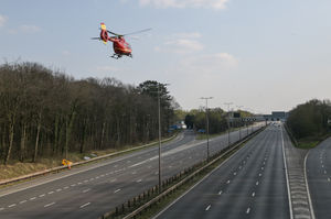 Traffic was halted in both directions for an air ambulance to land at the scene. Photo: SnapperSK