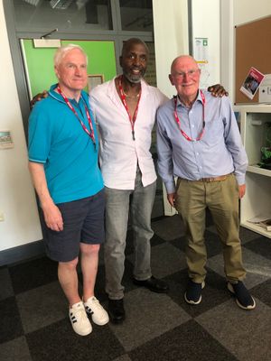 Willard Wigan with Mel Eves, left, and Roget Timbrell, right, who are both Rotary Club members
