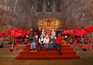 Shropshire Federation of Women's Institutes have decorated Shrewsbury Abbey with a mass of poppies for Remembrance Sunday.
