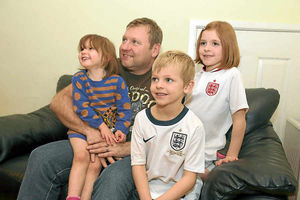 The Kennellys – from left, Caitlin, four, father Mike, Declan, eight, and Niamh, nine