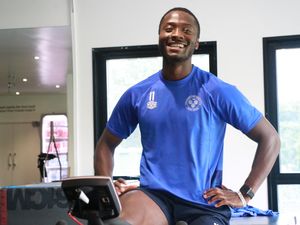 Supporting image for story: Daniel Udoh cheerful as Shrewsbury players check in