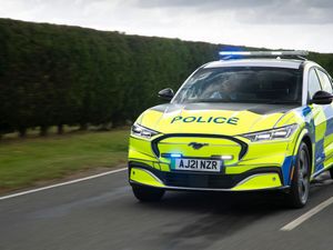 Supporting image for story: Ford’s Mustang Mach-e police car concept is an electric blue light option
