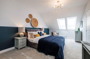 The main bedroom of the four bedroom Woodcote style home