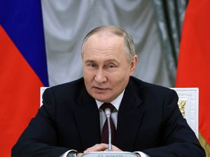 Supporting image for story: Putin arrives in Beijing for visit as China and Russia put on show of unity