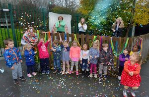 Staff Tina Mitchell, Michelle Harper, Cara Moss and Georgie Stanton let off confetti with the pre-school children