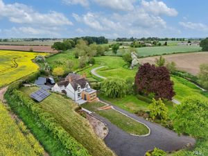 Supporting image for story: Converted water mill cottage with separate home and campsite within extensive grounds hits the market