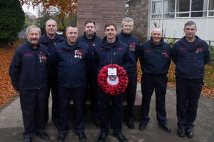 Presteigne firefighters at the war memorial. (Image: Karen Compton)