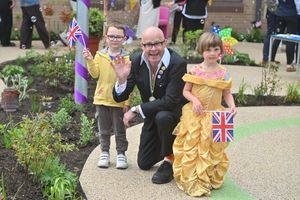 Harry Hill with youngsters Theo Huxley and Nicole Hodge.