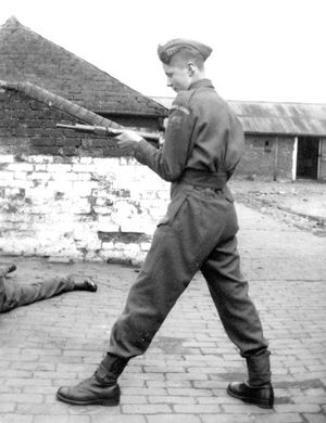 Teenage Home Guard soldier Glyn Rowlands with a Sten gun at Coton Hill Farm in April 1943.