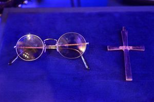 Ozzy Osbourne's iconic glasses and cross