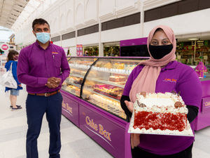 Supporting image for story: Cake Box arrives at Merry Hill