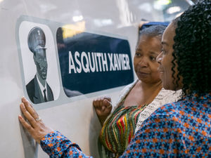Supporting image for story: Daughters of railway worker who overturned racist recruitment policy unveil train named after him