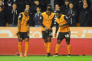 Magic, you know... Sako, centre, with Benik Afobe, left, and Nouha Dicko