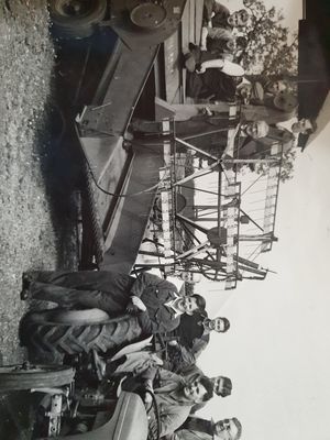 Fred Morris, seated on the tractor, worked in an agricultural and motor engineering workshop