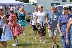 Line dancing at the Rebel Rising Country and Music Festival at Alveley near Bridgnorth