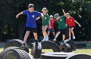 Oscar 9 in blue, Theo, 9, and Eden, 9, in red, and Rosie, 9 and Jonah, 8, in green
