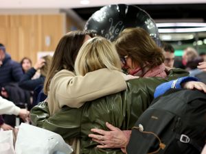 Supporting image for story: Relieved family reunions at Dublin Airport as chartered flight lands