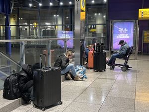 Stranded passengers at Heathrow Terminal 5 in London