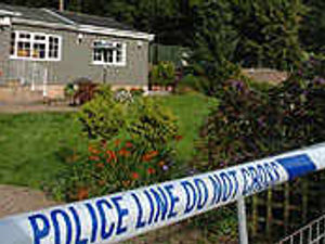 Supporting image for story: Families flee landslide threat