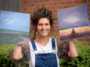 Supporting image for story: Stephanie sets up paintings' raffle draw for good causes