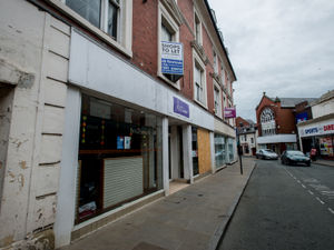 Supporting image for story: Plans for empty property to become mini shopping mall and apartments