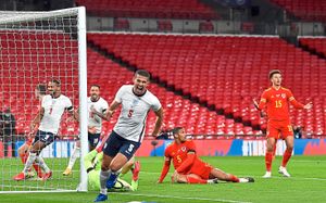 England's Conor Coady celebrates scoring for England against Wales at Wembley Stadium