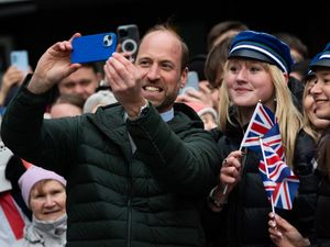 Prince of Wales taking a selfie with people in Estonia