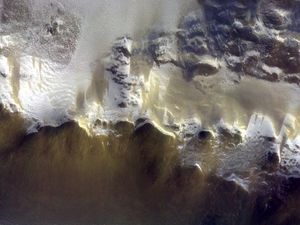 Supporting image for story: ExoMars spacecraft sends back first images of Martian crater covered in ice