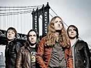 Supporting image for story: James drums through the pain barrier