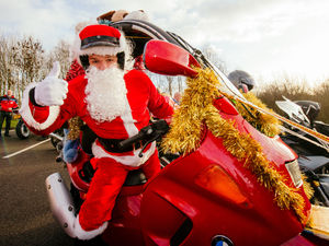 Supporting image for story: GALLERY: Christmas cheer as bikers deliver presents for children in hospital