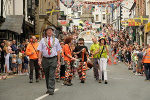 Knighton Mayor Councillor Tom Taylor leads the procession