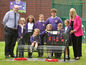 Supporting image for story: Memorial bench installed at tragic soldier's 'happy place' in his old school