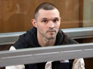 Supporting image for story: Russian court begins trial of US soldier arrested on theft charges