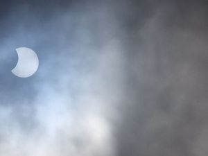 Supporting image for story: Photographers across the region capture partial eclipse