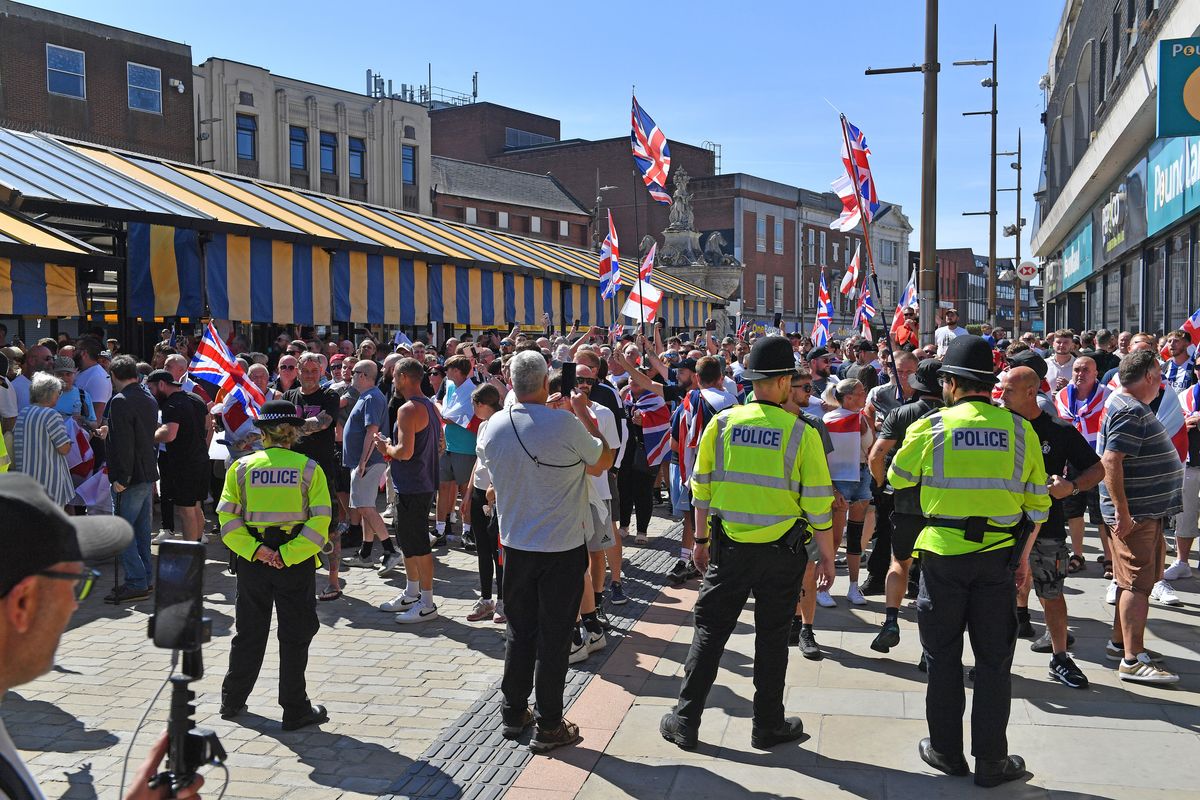 Temperatures rise in Dudley as counter protests around asylum seekers draw hundreds to town centre