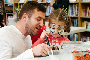  Dad Carl Johnson and Daughter four year old Esther at Market Drayton's libary's Christmas party