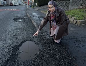 Cllr Adeela Qayyum with some of the potholes in Dudley that Labour say need a pothole czar to fix. Picture Dudley Labour free for LDRS use