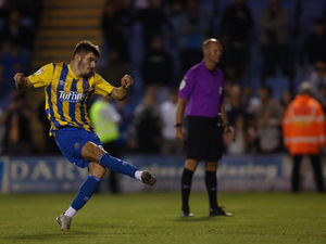 Supporting image for story: Shrewsbury Town pitch invaders 'will be banned' after Carabao Cup shootout win
