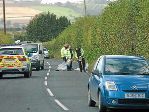 Supporting image for story: Car hit Shropshire good Samaritan as cyclist lay dying, court told