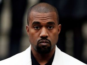 Supporting image for story: Kanye West makes surprise appearance on stage with Travis Scott in Rome