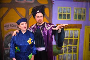 Abanazar weaves dark magic as he lures Aladdin toward the fated lamp.” Abanazar (Gareth Jones) Aladdin (Emma Davies)